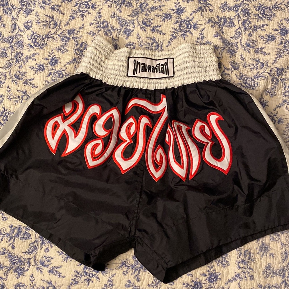 Black and White Muay Thai Shorts with Red Embroidery